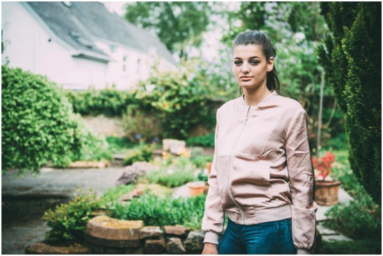 female model portrait in a garden