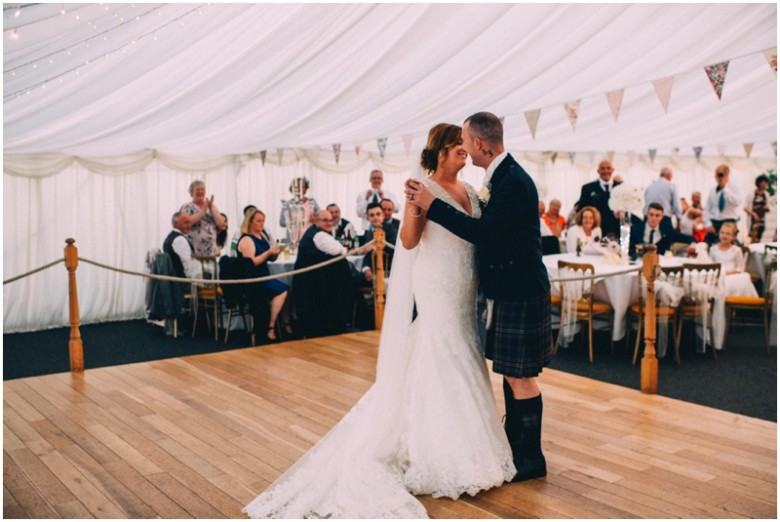 bride and grooms first dance