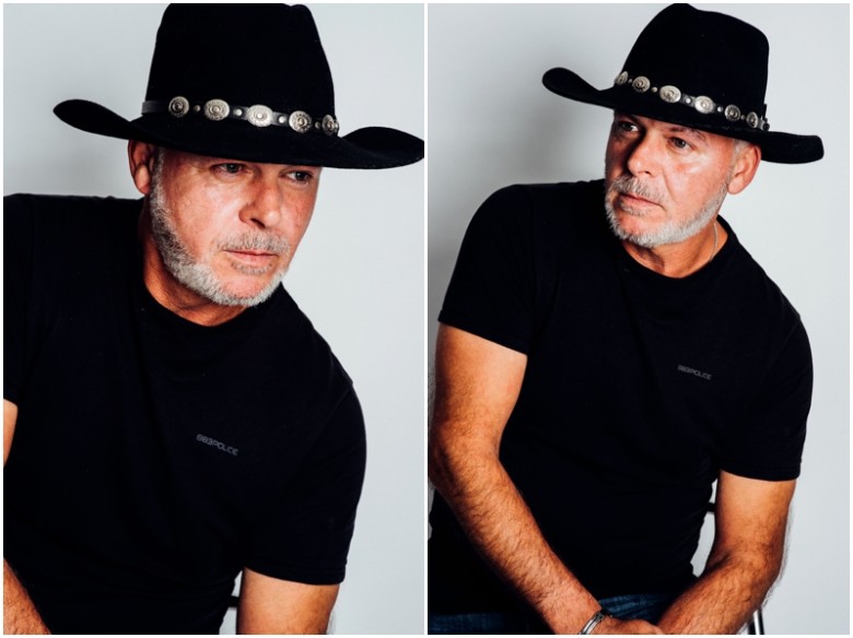 mature male model wearing a hat