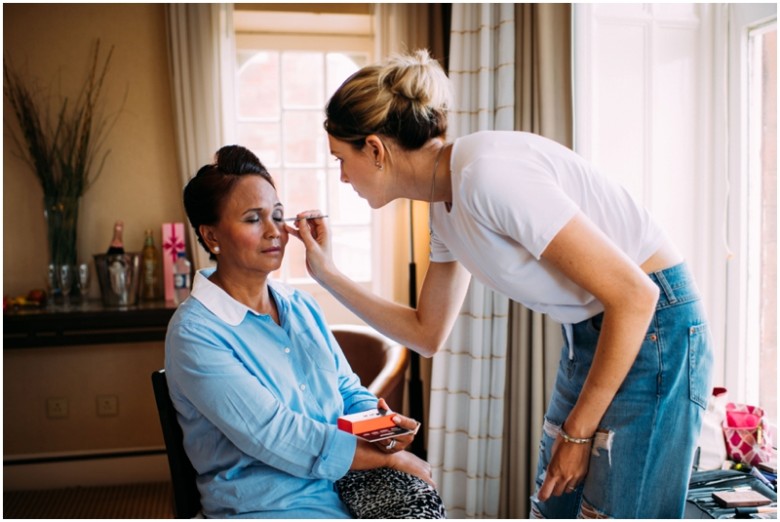 bride and bridesmaids getting ready for the wedding