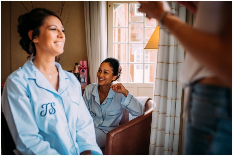 bride and bridesmaids getting ready for the wedding