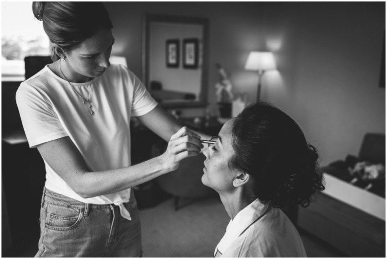 bride and bridesmaids getting ready for the wedding