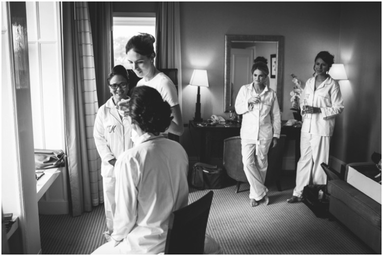 bride and bridesmaids getting ready for the wedding