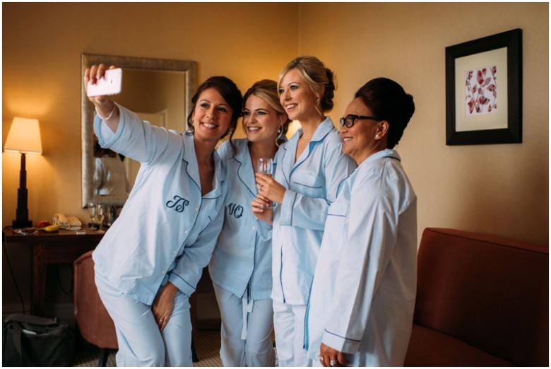 bride and bridesmaids getting ready for the wedding