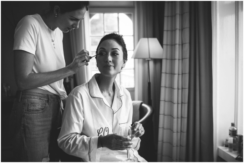 bride and bridesmaids getting ready for the wedding