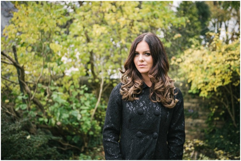 girl photographed in a garden