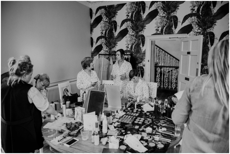 bride and bridesmaids getting ready