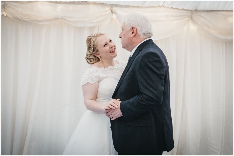 bride dancing with her dad