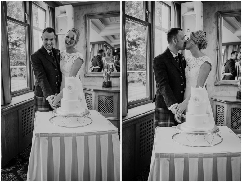 bride and groom cutting the cake