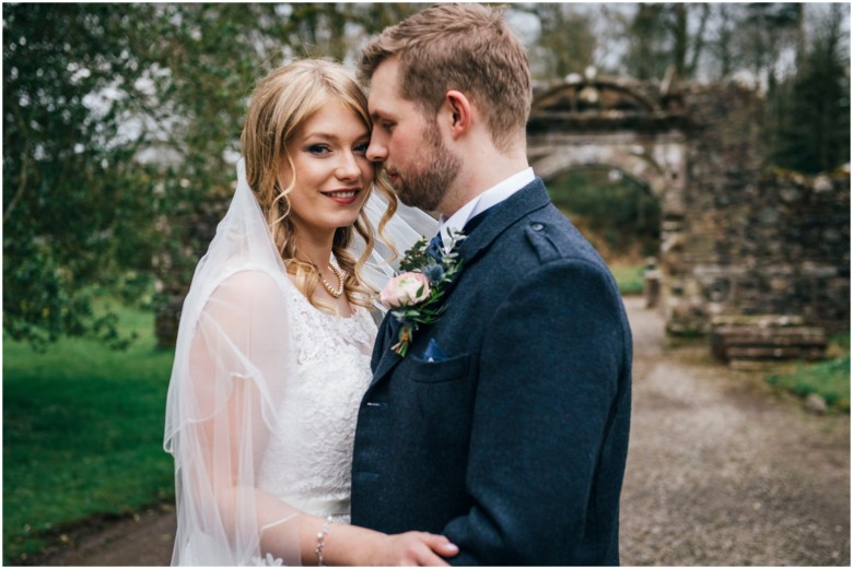 bride and groom in a scottish castle