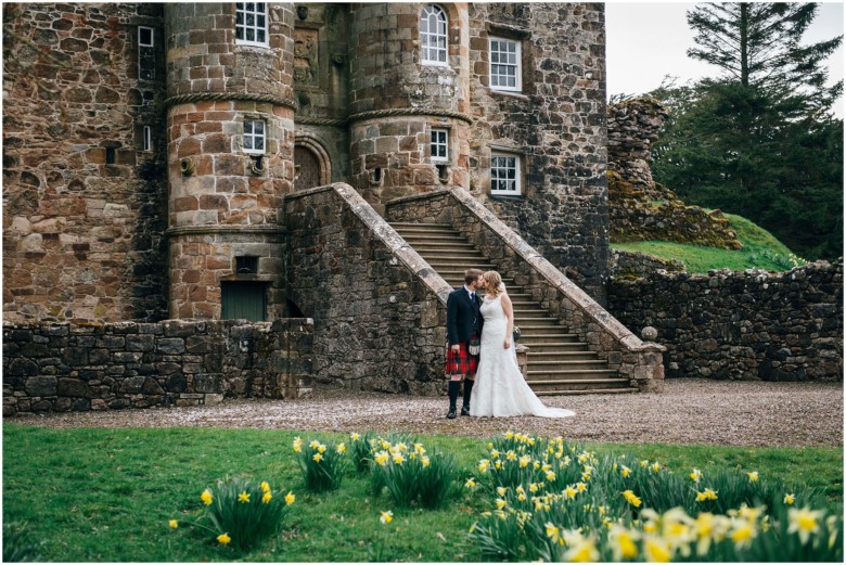 bride and groom in a scottish castle