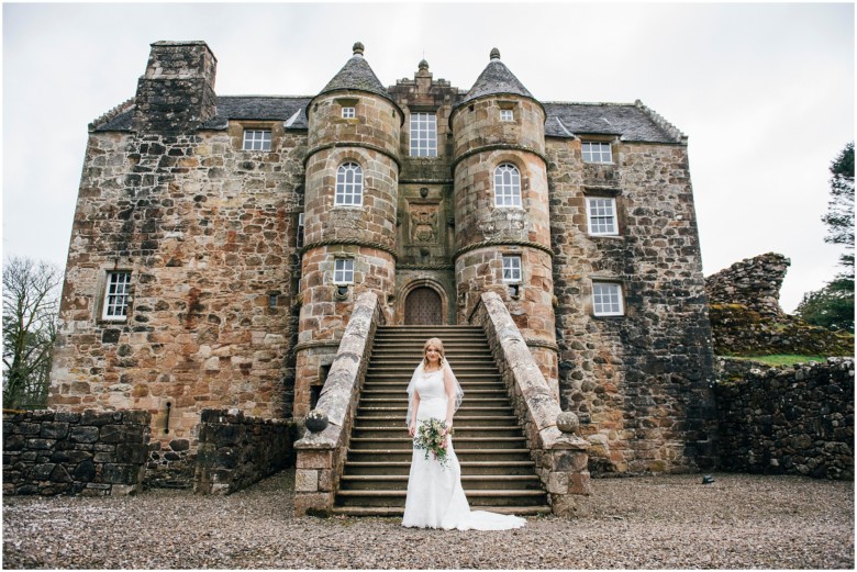 bride and groom in a scottish castle