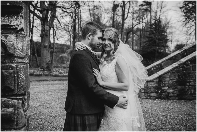 bride and groom in a scottish castle