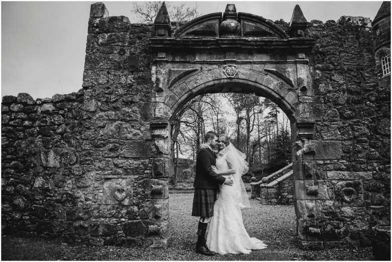 bride and groom in a scottish castle