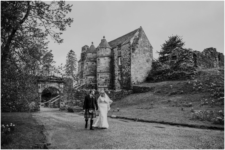 bride and groom in a scottish castle