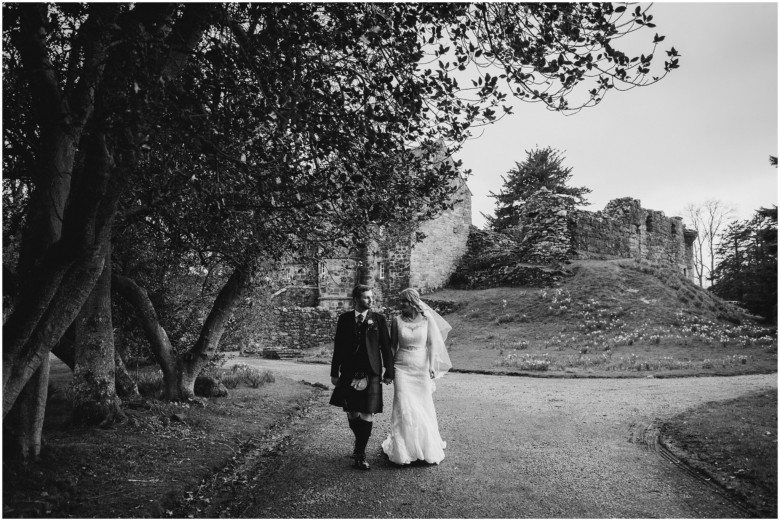 bride and groom in a scottish castle