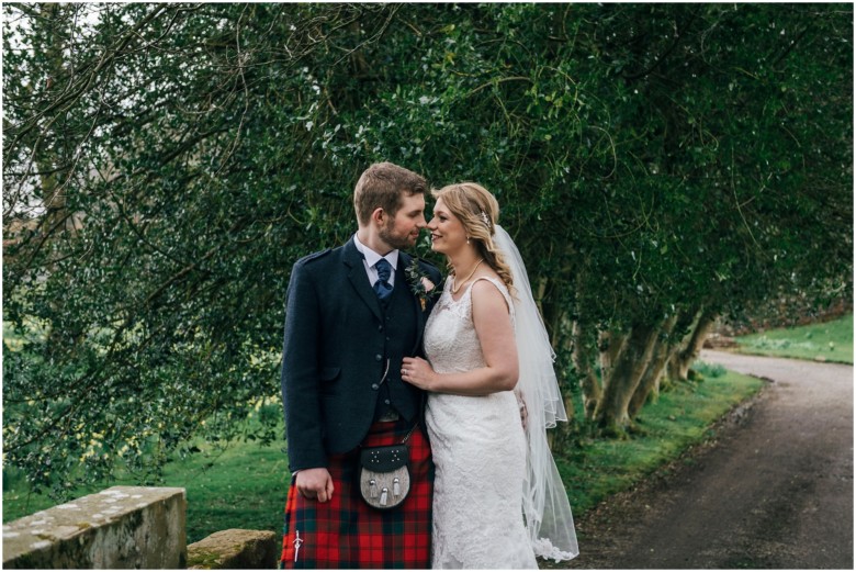 bride and groom in a scottish castle