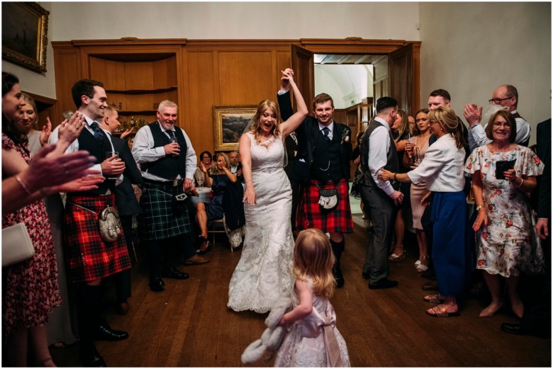 bride and groom in a scottish castle