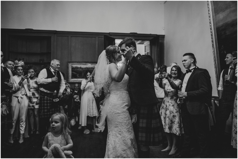 bride and groom in a scottish castle