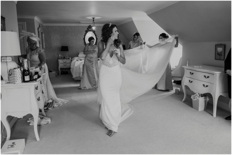 bride and her bridesmaids getting ready for the wedding