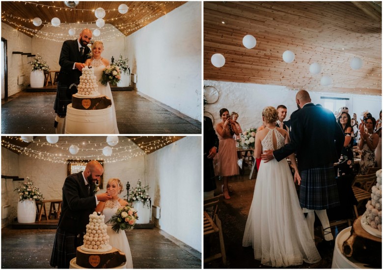 bride and groom cutting the cake