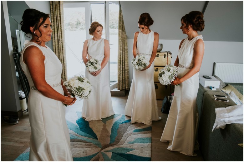 Two guys and their bridesmaids getting ready for their same sex wedding