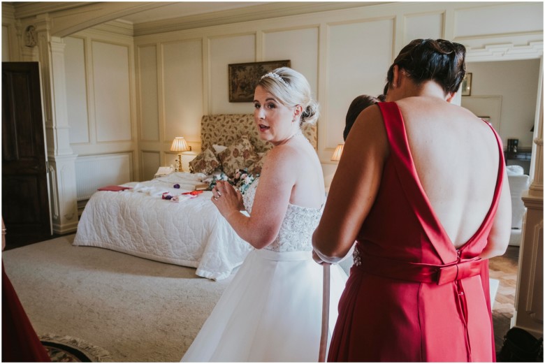 bride and bridesmaids getting ready