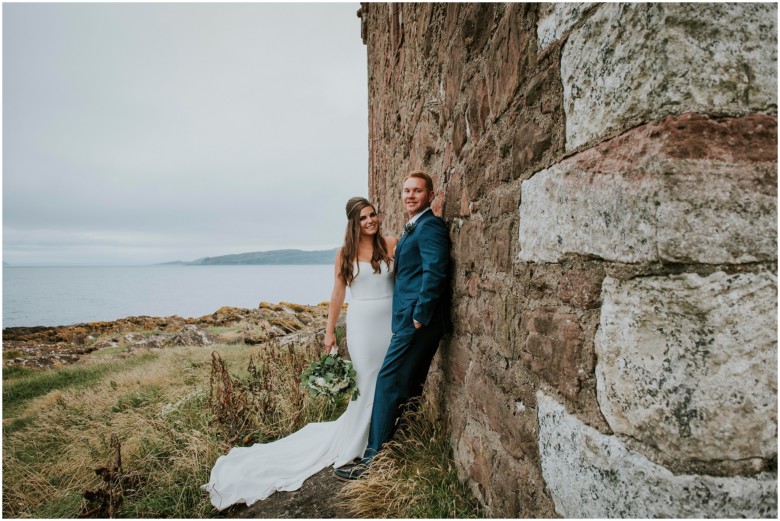 bride and groom photographed at a scottish castle