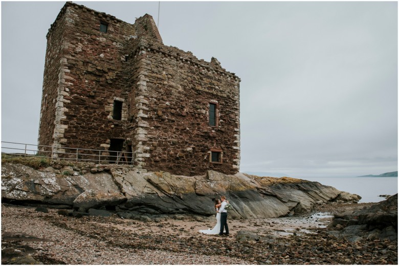 bride and groom photographed at a scottish castle