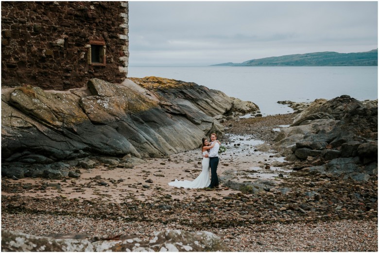 bride and groom photographed at a scottish castle