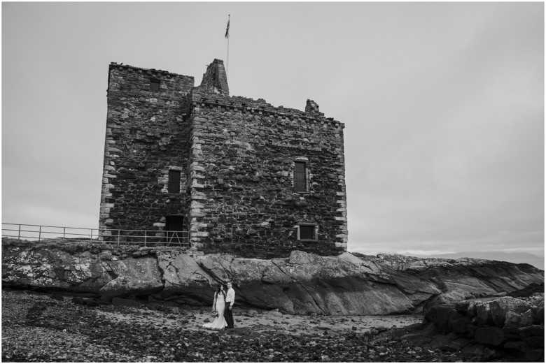 bride and groom photographed at a scottish castle