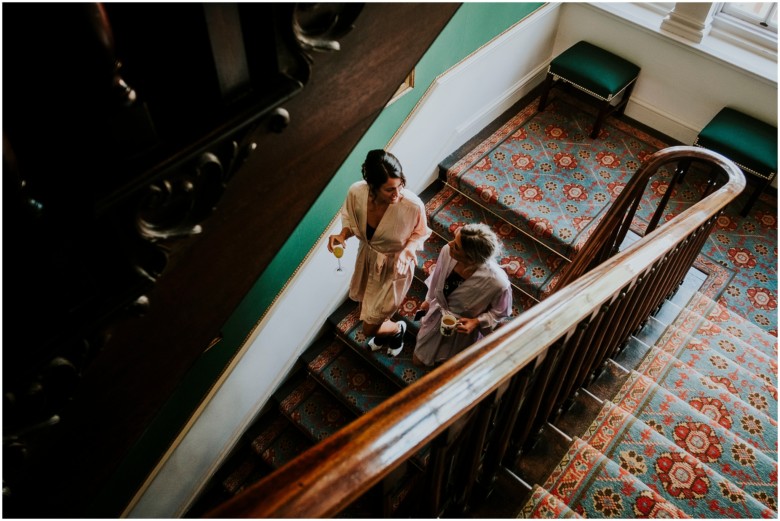 bride and her bridesmaids getting ready