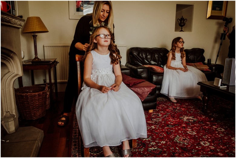 bride and her bridesmaids getting ready for her wedding