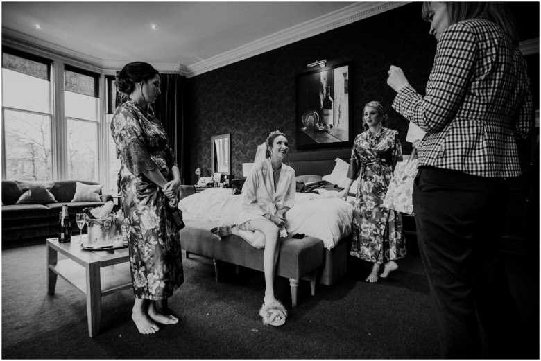 bride and her bridesmaids getting ready