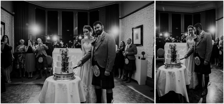 bride and groom cutting the cake