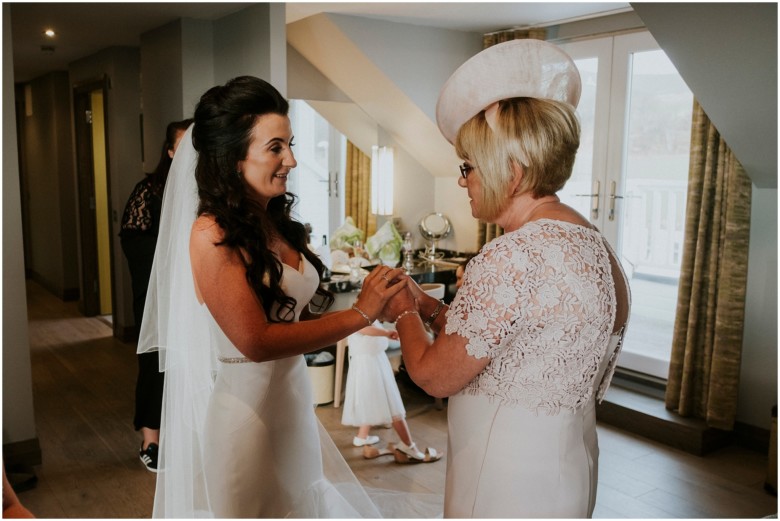 bride and her bridesmaids getting ready