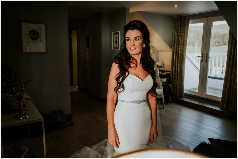 bride and her bridesmaids getting ready