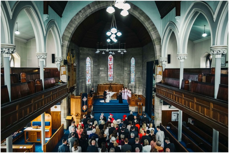 bride and groom at their wedding ceremony in a church