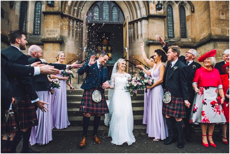 bride and groom leaving the church