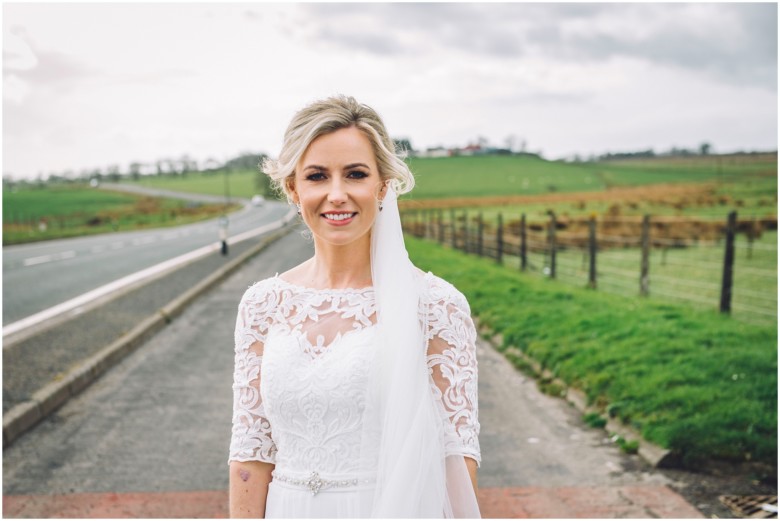 bride and groom at their rustic barn wedding