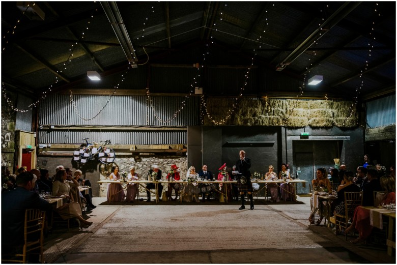 wedding speeches in a rustic barn