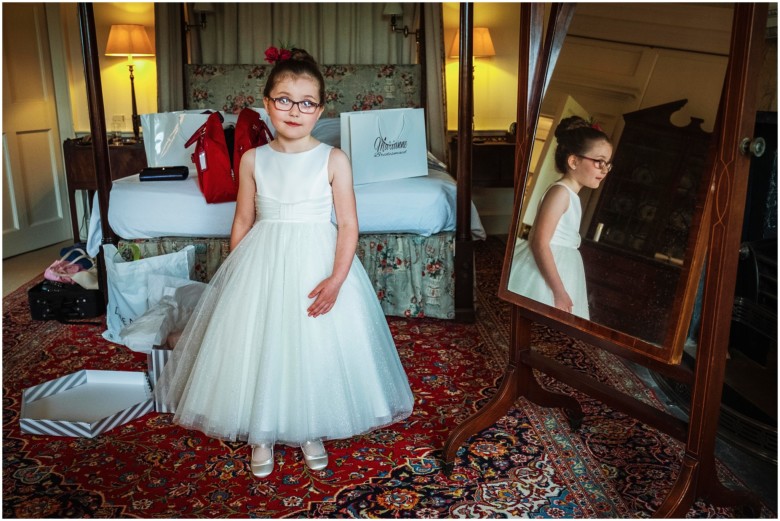 bride and her bridesmaids getting ready