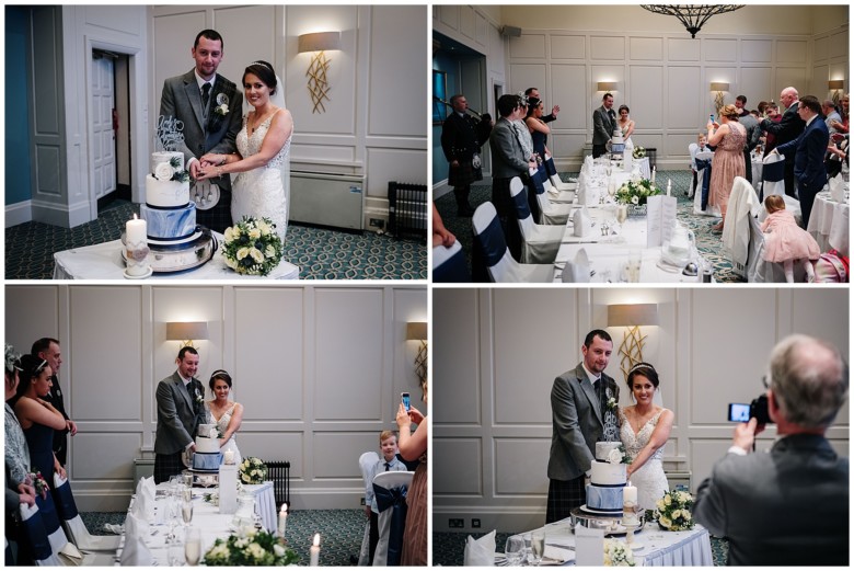 bride and groom cutting the cake