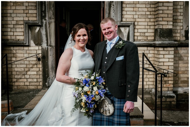 bride and groom at the church